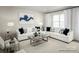 Bright living room featuring two sofas, a modern coffee table, and large windows with white curtains at 5030 Grain Orchard Rd # 3025C, Indian Trail, NC 28079