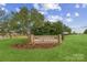 East Lincoln High School entrance sign amidst lush greenery, showcasing a well-maintained landscape at 522 Lenswood Ct, Denver, NC 28037