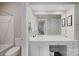 Bathroom includes tub, toilet, and white vanity sink with a large mirror at 5400 Challisford Ln, Charlotte, NC 28226