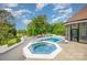 Beautiful pool area with a hot tub, a pool, and great views of the yard at 5400 Challisford Ln, Charlotte, NC 28226
