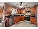 Functional kitchen featuring stainless steel appliances, dark countertops, and ample cabinet space for storage at 544 Cool Creek Dr, Rock Hill, SC 29732