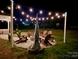 Inviting backyard with a cozy fire pit area, perfect for outdoor gatherings and relaxation under the stars at 6016 Willow Pin Ln, Huntersville, NC 28078