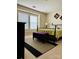 Comfortable bedroom featuring a decorative metal bed frame, bench and large windows for natural light at 6509 Ridgeview Commons Dr, Charlotte, NC 28269