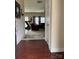 Inviting entryway leading to a spacious living room with hardwood floors and ample natural light at 6509 Ridgeview Commons Dr, Charlotte, NC 28269