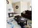 Spacious living room featuring an area rug, comfortable furniture, and stylish decor at 6509 Ridgeview Commons Dr, Charlotte, NC 28269