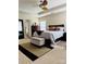 Relaxing main bedroom with neutral tones, comfortable furnishings, and an en-suite bathroom at 6509 Ridgeview Commons Dr, Charlotte, NC 28269