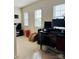 Bright home office space featuring a large desk, ample natural light, and functional layout at 6509 Ridgeview Commons Dr, Charlotte, NC 28269