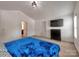 Spacious bedroom features vaulted ceiling, wall-mounted TV, and windows that bring in plenty of natural light at 6541 Hasley Woods Dr, Huntersville, NC 28078