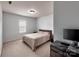 Cozy bedroom featuring a comfortable bed, soft lighting, and a serene atmosphere at 6541 Hasley Woods Dr, Huntersville, NC 28078