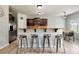 Kitchen bar features counter seating and stainless steel appliances with granite countertops at 6541 Hasley Woods Dr, Huntersville, NC 28078