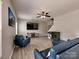 Bright and airy living room features sleek flooring and neutral walls, ideal for modern living at 6541 Hasley Woods Dr, Huntersville, NC 28078
