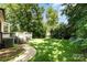 Outdoor living with a spacious deck overlooking a lush backyard, perfect for relaxation and entertaining at 7587 Long Valley Dr, Harrisburg, NC 28075