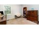 Bedroom featuring a dresser, bookshelf, side table and window at 7587 Long Valley Dr, Harrisburg, NC 28075