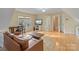 Spacious bonus room with a seating area, table, and natural light, perfect for relaxation or work at 7687 Bermuda Hills Ln, Denver, NC 28037