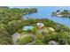 Aerial view of community pool, tennis courts, lake access, and clubhouse at 7687 Bermuda Hills Ln, Denver, NC 28037