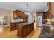 Spacious kitchen with granite countertops and stainless steel appliances at 7687 Bermuda Hills Ln, Denver, NC 28037