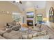 Cozy living room with a fireplace and vaulted ceilings at 7687 Bermuda Hills Ln, Denver, NC 28037