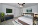 Bright bedroom featuring modern furnishings, neutral decor, and ample closet space at 9029 Woodview Ct, Fort Mill, SC 29707