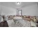 Inviting living room area features a custom seating arrangement, soft lighting, and a comfortable atmosphere at 9029 Woodview Ct, Fort Mill, SC 29707