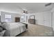 Spacious main bedroom features neutral colors, large windows, walk-in closet, and modern decor at 9029 Woodview Ct, Fort Mill, SC 29707