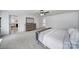 Spacious main bedroom features neutral colors, large windows, walk-in closet, and modern decor at 9029 Woodview Ct, Fort Mill, SC 29707