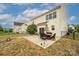 Backyard patio with outdoor dining set and grill, perfect for entertaining at 9159 Marasol Ln, Concord, NC 28027