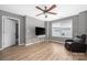 Comfortable bedroom featuring a ceiling fan, a window with blinds, and neutral tones for a relaxing atmosphere at 9159 Marasol Ln, Concord, NC 28027