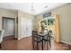 Bright dining room with a view to the backyard through sliding glass doors and adjacent to a set of double doors at 9159 Marasol Ln, Concord, NC 28027