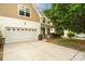 Traditional two-story home with attached garage and well-maintained landscaping at 9159 Marasol Ln, Concord, NC 28027
