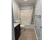 Standard bathroom features a shower and tub with a tiled floor at 925 Grace Ave, Lancaster, SC 29720