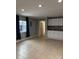 Bright living room featuring a combined kitchen and a tiled floor at 925 Grace Ave, Lancaster, SC 29720