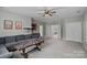 Second bonus room featuring comfortable seating, neutral walls, and cozy carpet at 9624 Barnburgh Ln, Huntersville, NC 28078