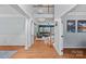 Spacious foyer featuring hardwood floors and staircase leading to the upper level at 9624 Barnburgh Ln, Huntersville, NC 28078