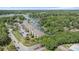 Stunning aerial view showcasing condos nestled along the waterfront, surrounded by lush greenery at 108 Pier 33 Dr # 414, Mooresville, NC 28117