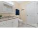 Bright bathroom featuring a vanity with granite countertop and tile floors at 108 Pier 33 Dr # 414, Mooresville, NC 28117