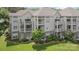 Attractive condo building with well-kept landscaping, balconies, and inviting curb appeal at 108 Pier 33 Dr # 414, Mooresville, NC 28117
