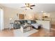 Inviting living room with comfortable seating, an area rug, and an open-concept design at 108 Pier 33 Dr # 414, Mooresville, NC 28117