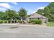 Community pool area with manicured landscaping and comfortable seating at 108 Pier 33 Dr # 414, Mooresville, NC 28117