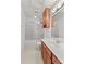 Bathroom featuring a vanity, toilet, and bathtub with glass shower doors at 115 Three Oaks Ln, Statesville, NC 28677