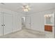 Comfortable bedroom with a ceiling fan, large closet, and natural light at 115 Three Oaks Ln, Statesville, NC 28677