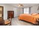 Bright bedroom with a ceiling fan and a large window allowing for ample natural light at 118 Sunrise Cir, Mooresville, NC 28117
