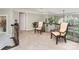Bright hallway with carpet, chairs, plants, and railing at 118 Sunrise Cir, Mooresville, NC 28117