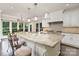 Spacious kitchen island with granite countertops, seating, and custom cabinetry at 118 Sunrise Cir, Mooresville, NC 28117