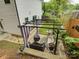 Overhead view of backyard patio featuring stone pavers, outdoor seating, and partial sunshade at 1209 Gaston Ave, Gastonia, NC 28052