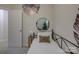 Cozy bedroom featuring a comfortable bed, side table, and decorative plants at 1209 Gaston Ave, Gastonia, NC 28052