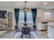 Chic dining area with modern lighting and comfortable seating at 1209 Gaston Ave, Gastonia, NC 28052