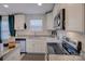 Cozy kitchen featuring granite counters, stainless appliances, and ample cabinet space at 1209 Gaston Ave, Gastonia, NC 28052