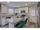 Well-equipped kitchen boasts granite countertops, stainless appliances, and a center island at 1209 Gaston Ave, Gastonia, NC 28052