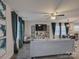 Open-concept living room with contemporary furnishings and ample natural light at 1209 Gaston Ave, Gastonia, NC 28052