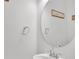 Contemporary half bathroom with a round mirror, modern faucet, and sleek design at 12110 Chesapeake Mallard Dr, Charlotte, NC 28262